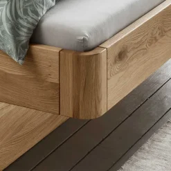 Holzbett mit Polsterkopfteil Pacurian